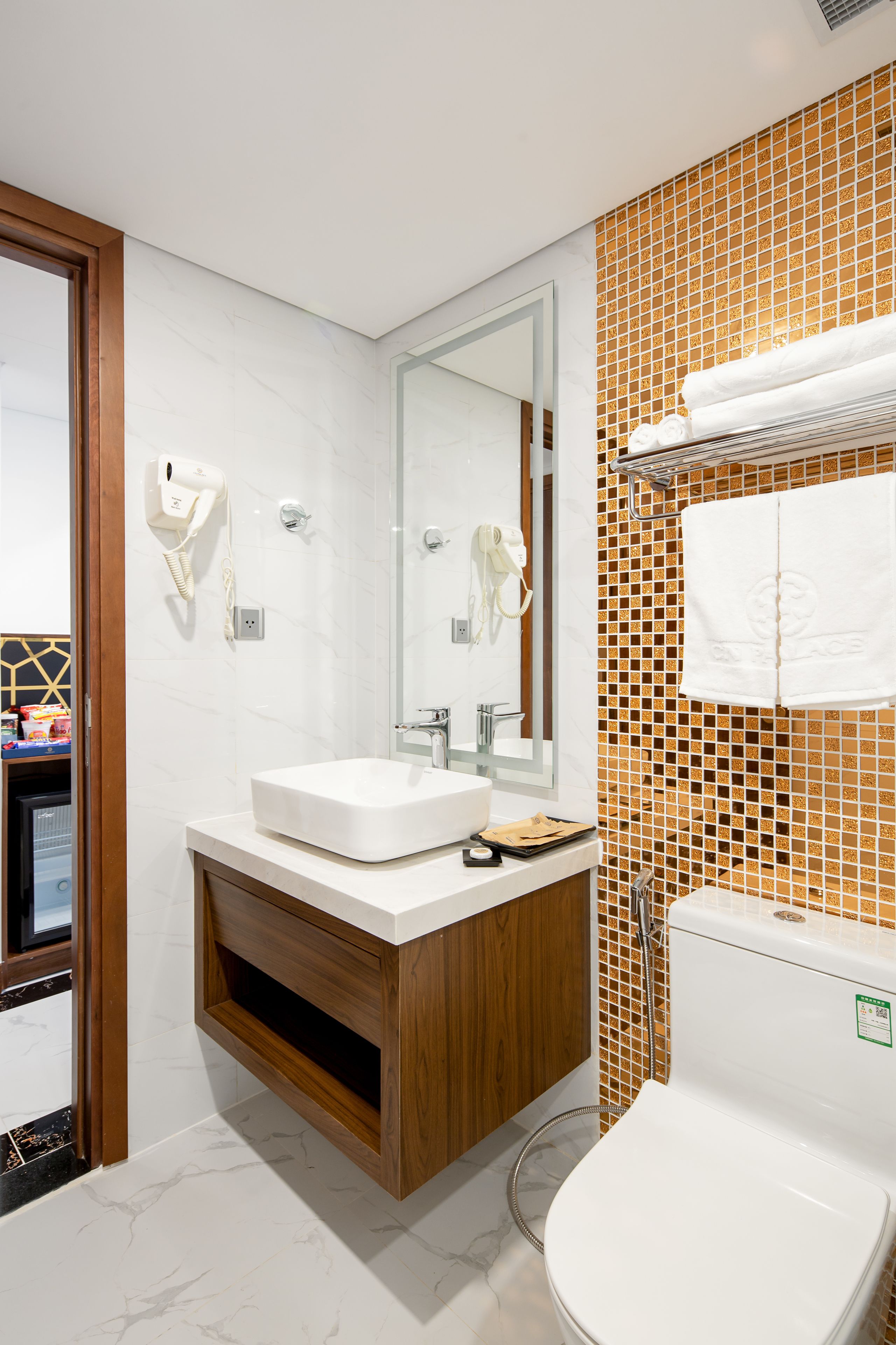 executive triple room | bathroom | free toiletries, hair dryer, bathrobes, slippers