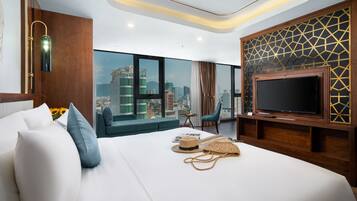 Suite King with Partial Sea View | Premium bedding, down duvets, memory-foam beds, minibar