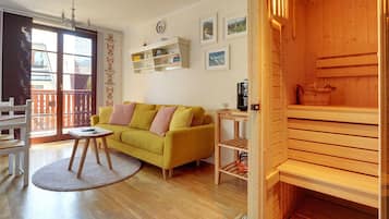 Appartement, sauna | Woonruimte | Flatscreentelevisie