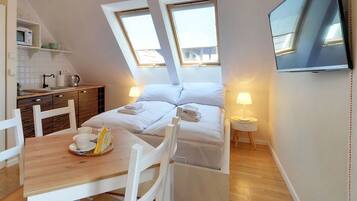 Apartemen, sauna | Setrika/meja setrika, Wi-Fi gratis, dan seprai linen