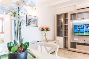 Panoramic Apartment, Multiple Beds, City View | Living area | 32-inch Smart TV with digital channels, TV