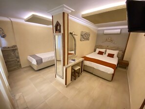 Family Room, Courtyard View | 1 bedroom, premium bedding, free minibar items, in-room safe - Golden Stone Otel (Cesme)