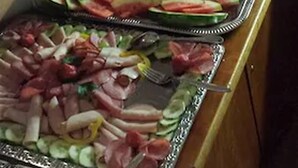 A buffet table with various food items including fruits, vegetables, and meats. - Hotel Restaurant Memo (Mannheim)