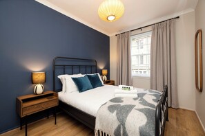 Departamento (1 Bedroom) | 1 habitación, tabla de planchar con plancha, wifi gratis y ropa de cama 