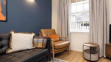 Appartement (1 Bedroom) | Woonruimte | Een flatscreentelevisie, Netflix en streamingdiensten