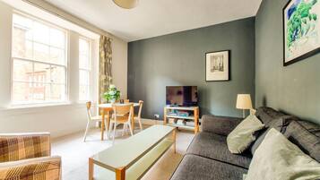Apartment (1 Bedroom) | Living area | TV