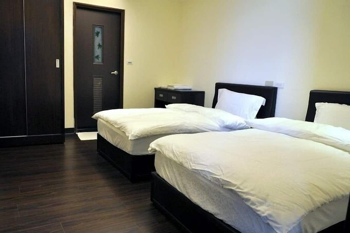 Habitación triple, vista al océano | Escritorio, cortinas blackout y wifi gratis 
