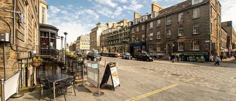 A street view with a restaurant named 'Stewart Brewing' and 'The Golden Dragon' Chinese Restaurant.