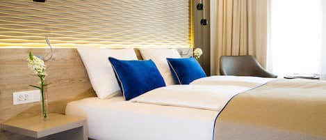 Egyptian cotton sheets, premium bedding, down comforters, minibar