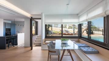 Sea View Suite with private pool | Living area | Smart TV