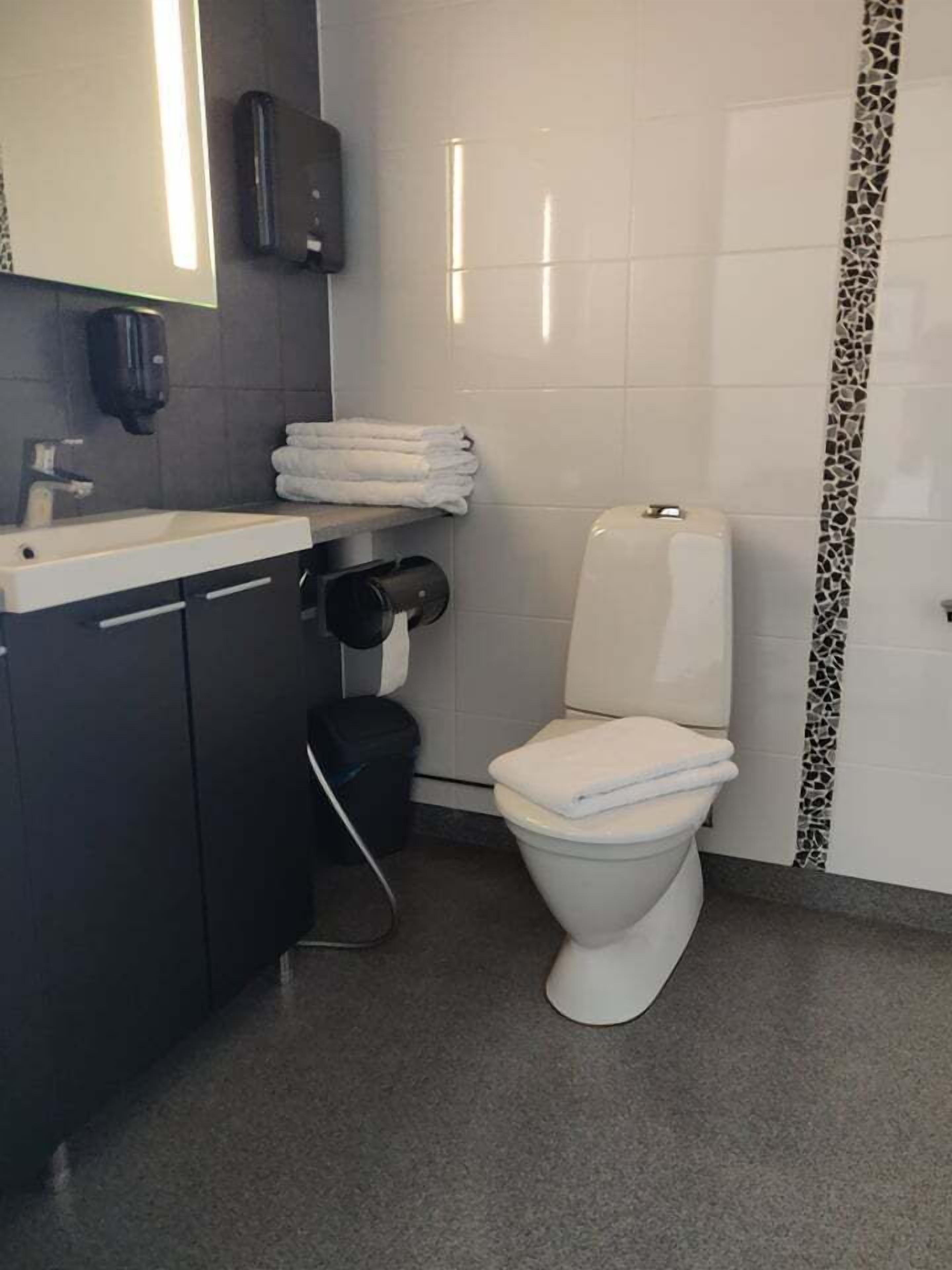 double or twin room | bathroom | shower, hair dryer, bidet, towels