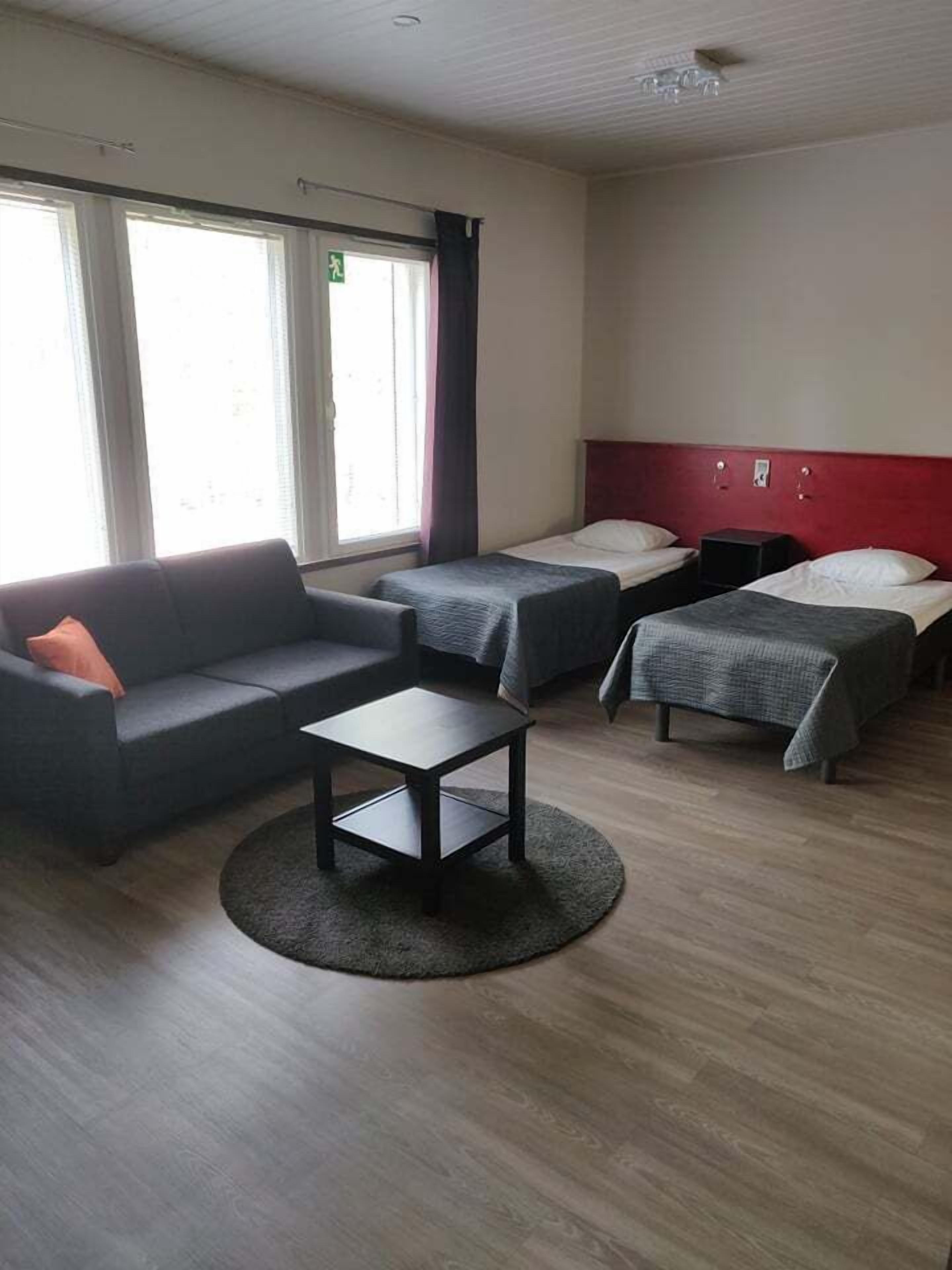 double or twin room | living room | flat-screen tv