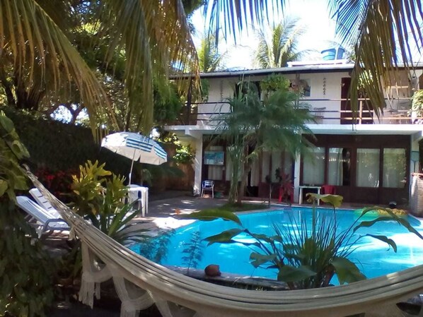 Outdoor pool, pool umbrellas, pool loungers