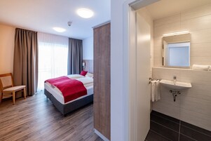Apartment, 1 Bedroom | Bathroom | Shower, hair dryer, towels, soap