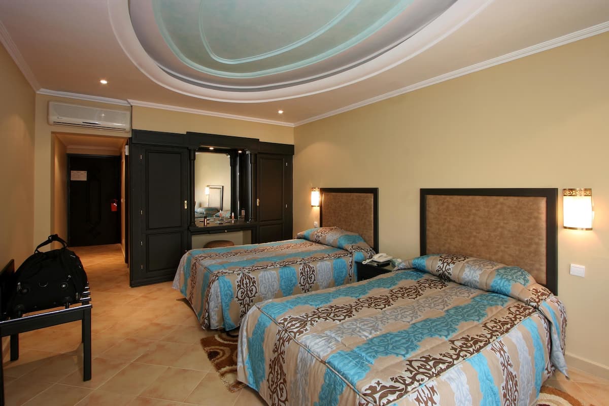 Desk, blackout drapes, WiFi (free), bed sheets