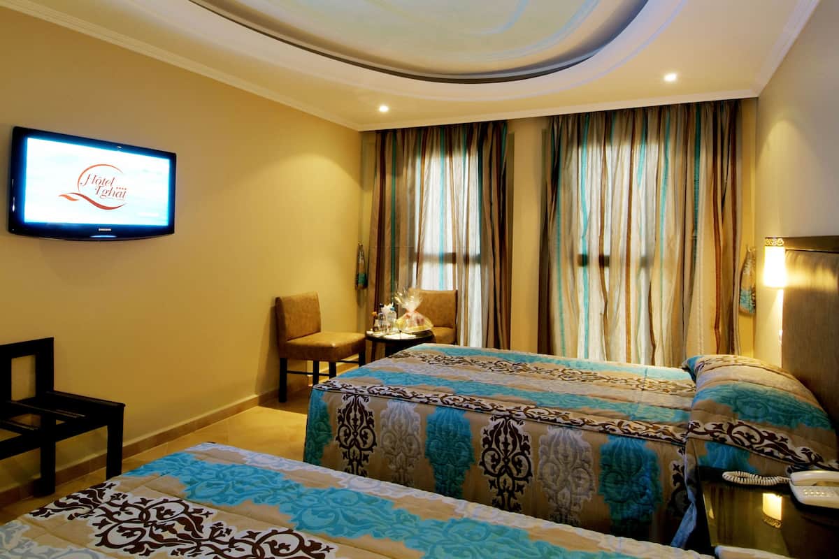 Desk, blackout drapes, WiFi (free), bed sheets