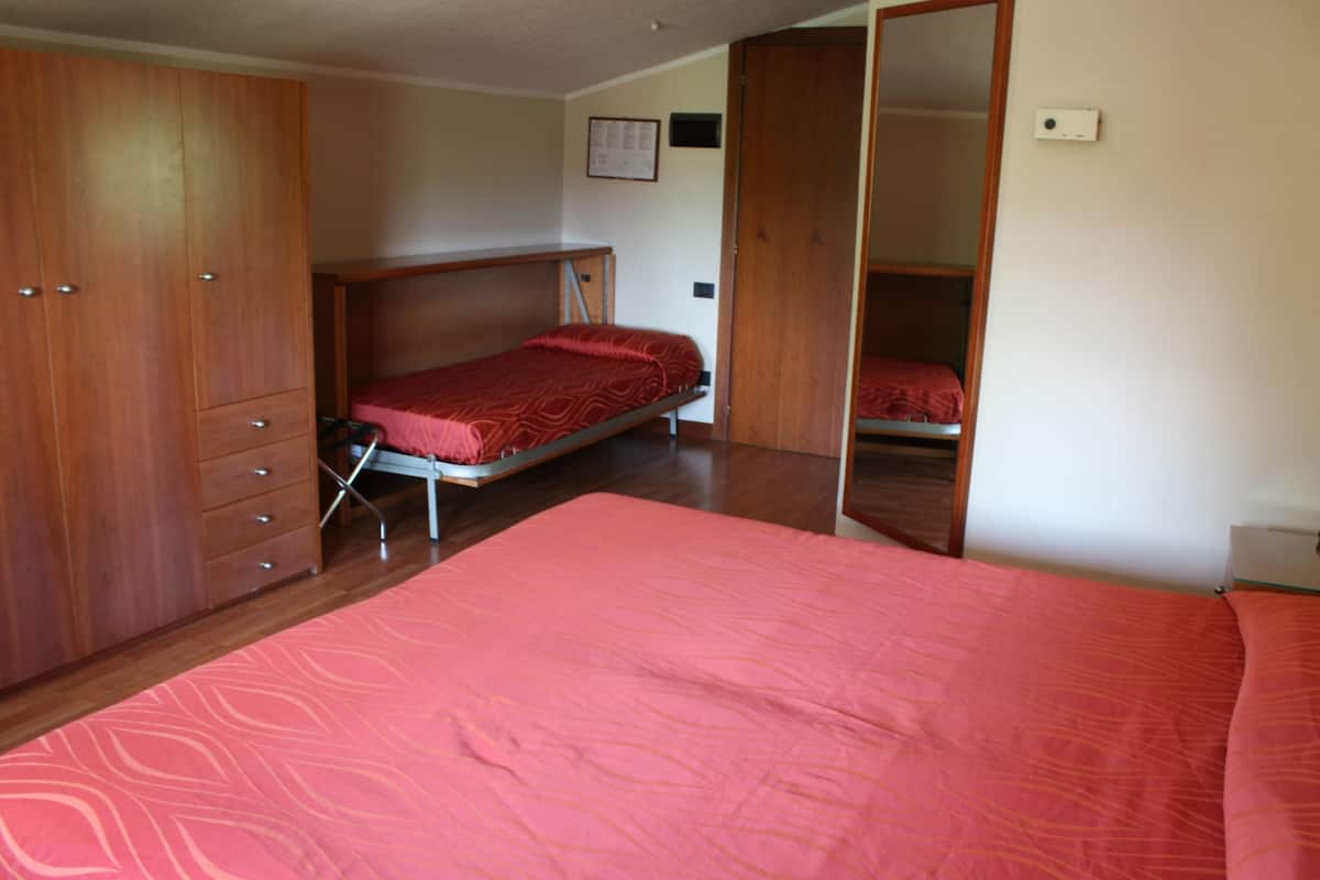 Economy Triple Room (Penthouse) | Minibar, in-room safe, blackout drapes, rollaway beds