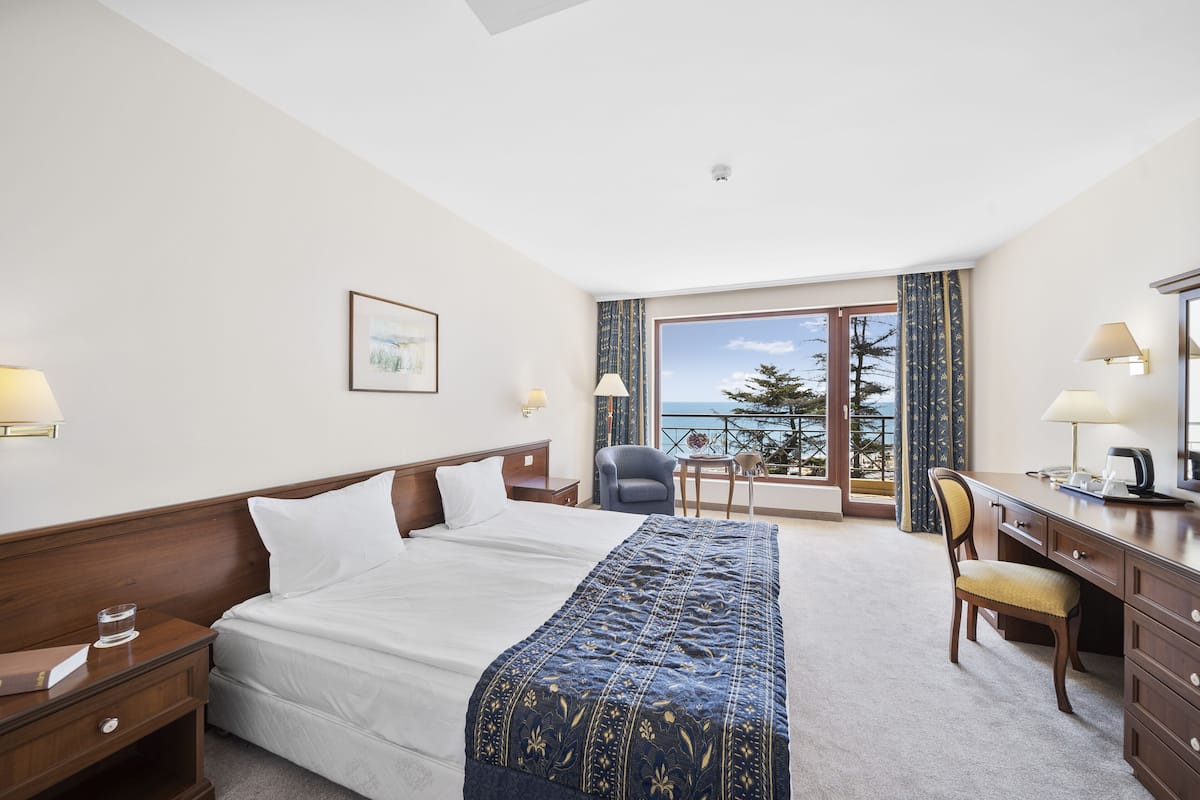 standard double room, sea view | minibar, in-room safe, free cots/infant beds, free wifi