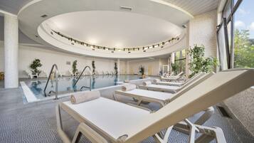 Indoor pool, seasonal outdoor pool, pool umbrellas, sun loungers