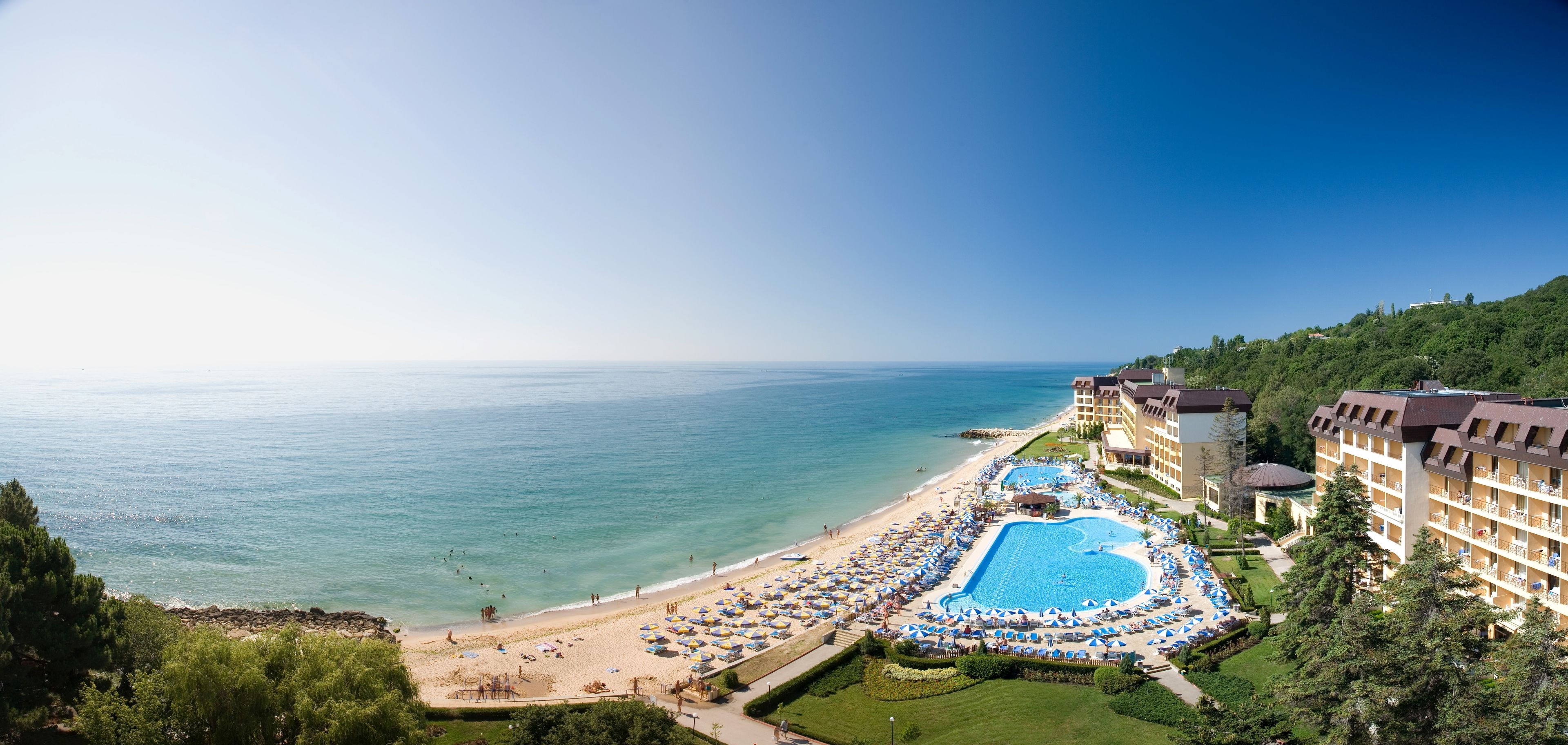 on the beach, sun-loungers, beach umbrellas, beach towels