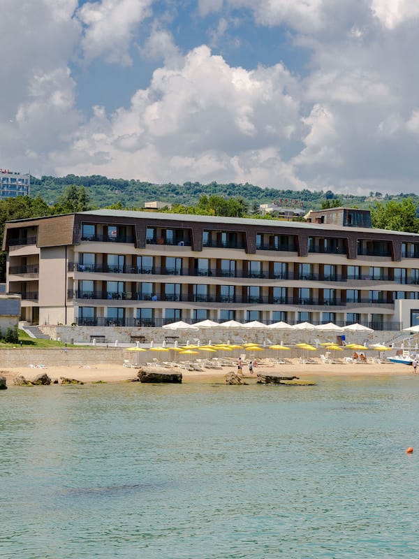 On the beach, sun loungers, beach umbrellas, beach towels