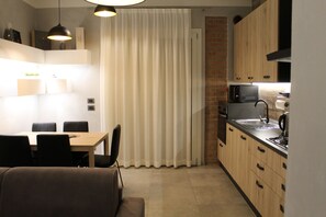 Comfort Apartment, 2 Bedrooms, Terrace, Garden | Private kitchen | Full-sized fridge, espresso maker, coffee/tea maker, electric kettle - Villa Martina (Desenzano del Garda)