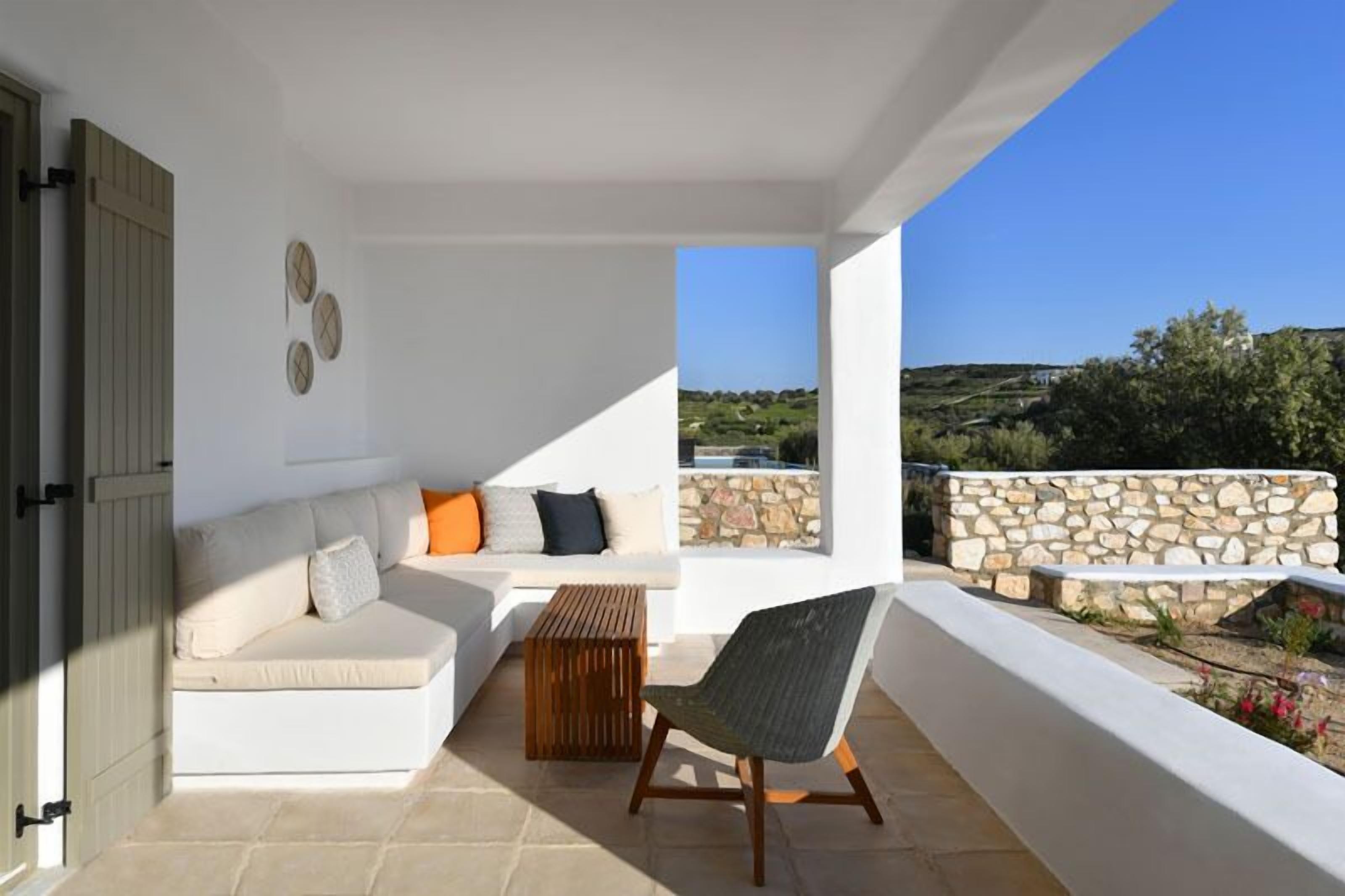 Villa, 3 Bedrooms, Sea View (Akaste) | Living area | Flat-screen TV, fireplace