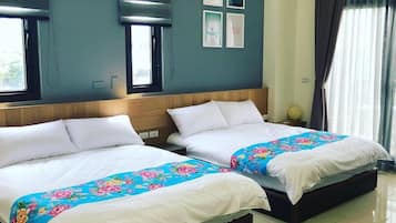 Desk, laptop workspace, blackout drapes, bed sheets