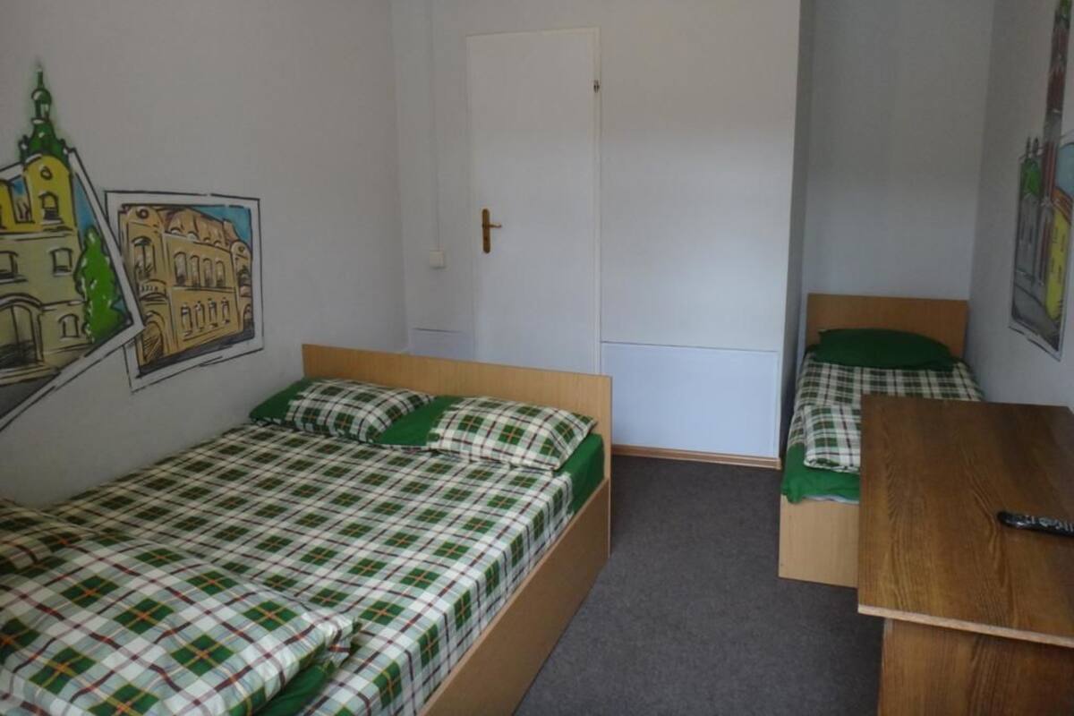 Standard Triple Room, Private Bathroom | Iron/ironing board, free WiFi, bed sheets