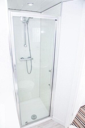 Shower, towels, soap, shampoo