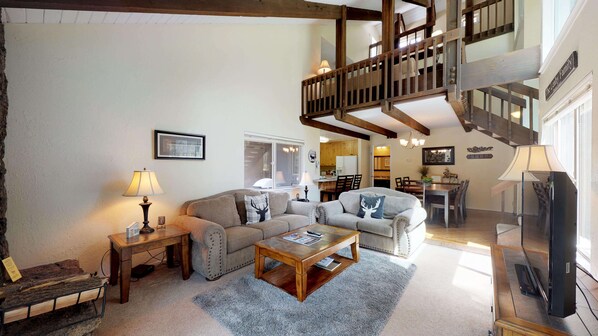 Televisio, takka, DVD-soitin, pöytäjalkapallopöytä