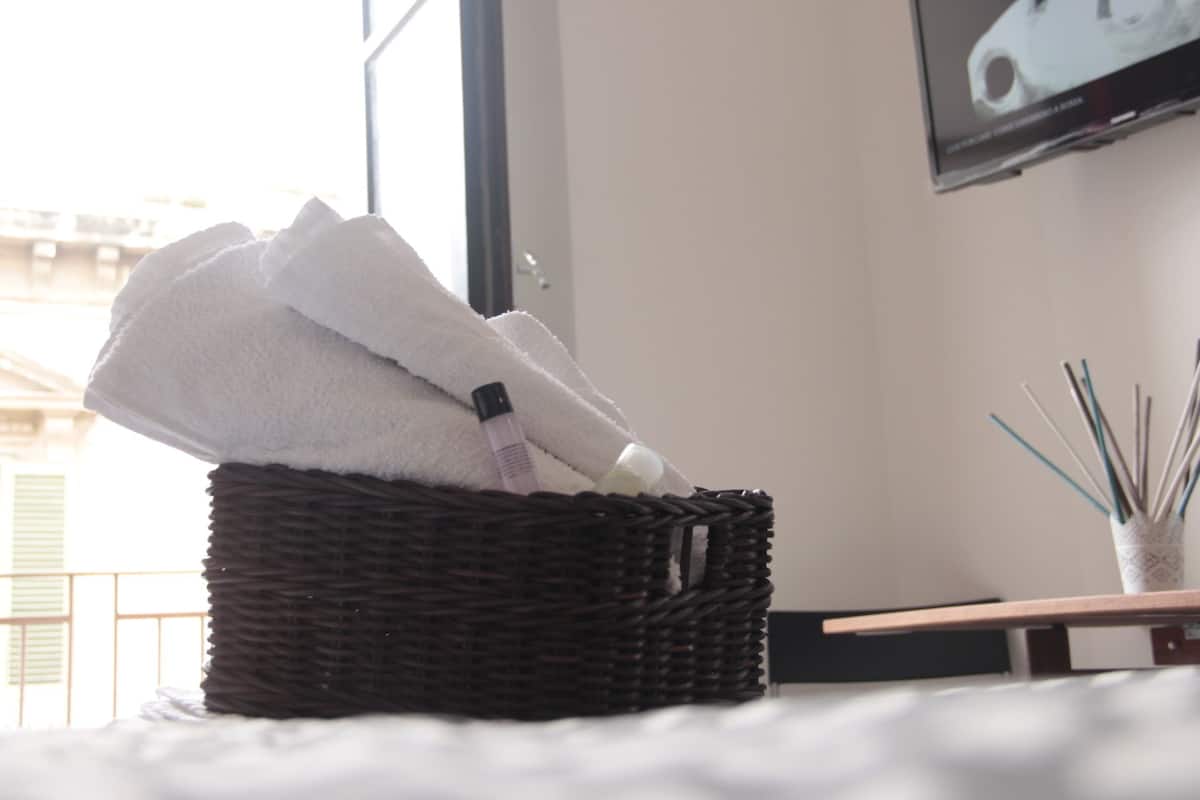 Tabla de planchar con plancha, cunas, camas extra y wifi gratis