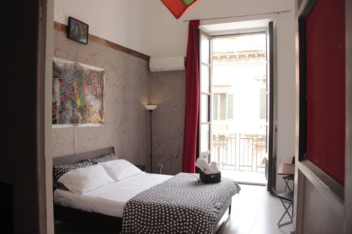 Habitación cuádruple Confort (Cubo di Rubik) | Tabla de planchar con plancha, cunas, camas extra y wifi gratis