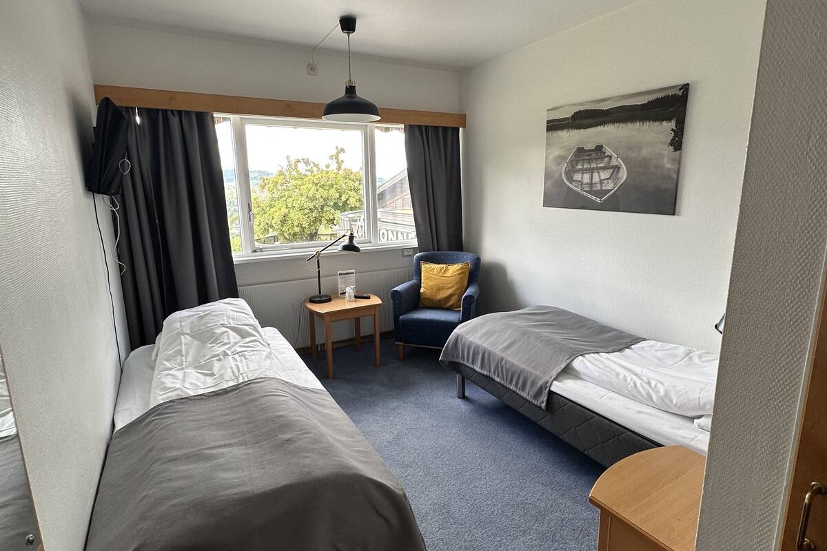 standard double room, 2 single beds, garden view | blackout curtains, free wifi, bed sheets
