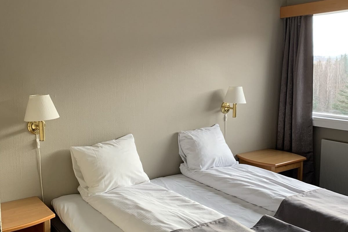 standard double room, 1 queen bed, garden view | blackout curtains, free wifi, bed sheets