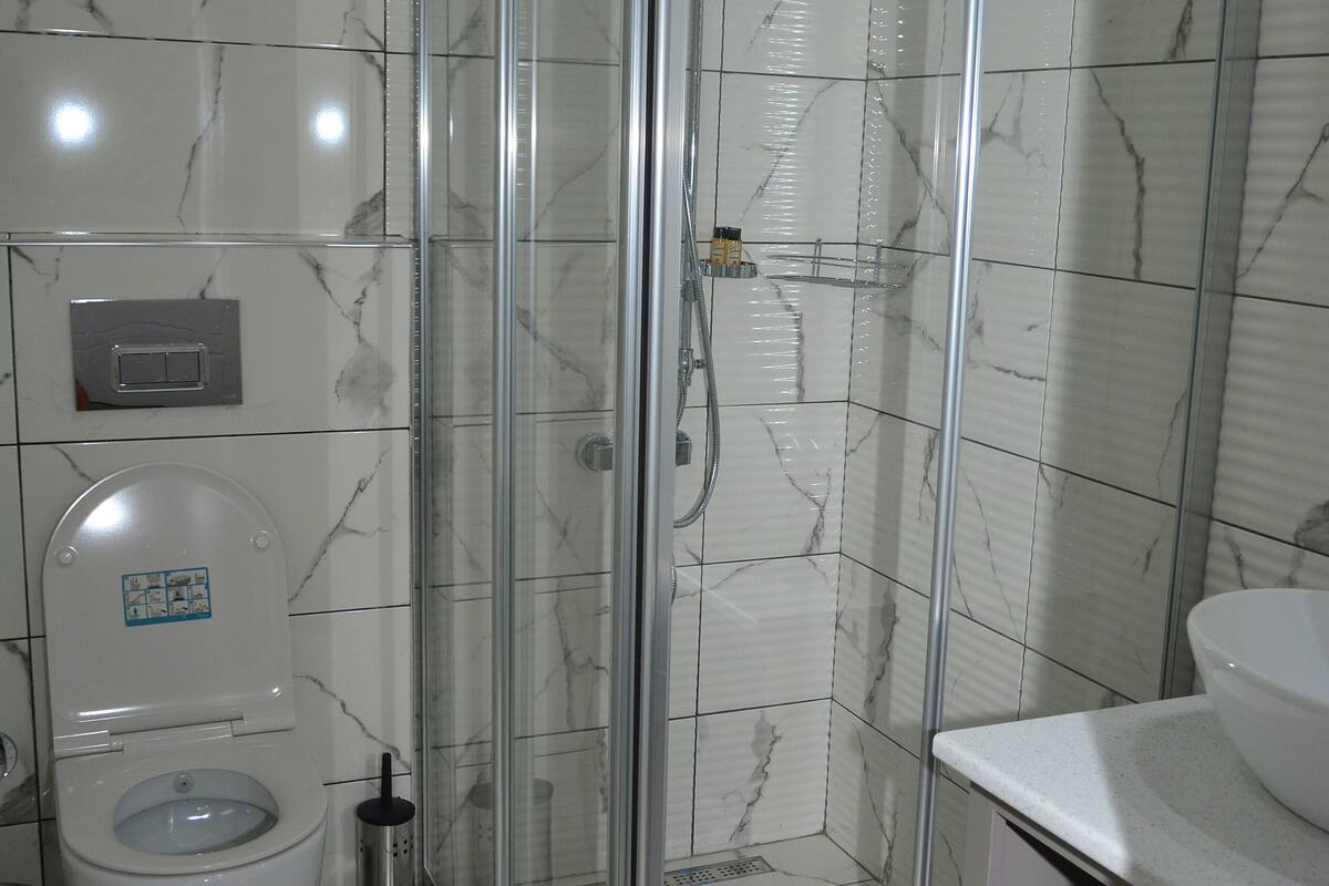 comfort room, mountain view | bathroom | shower, rainfall showerhead, free toiletries, hair dryer