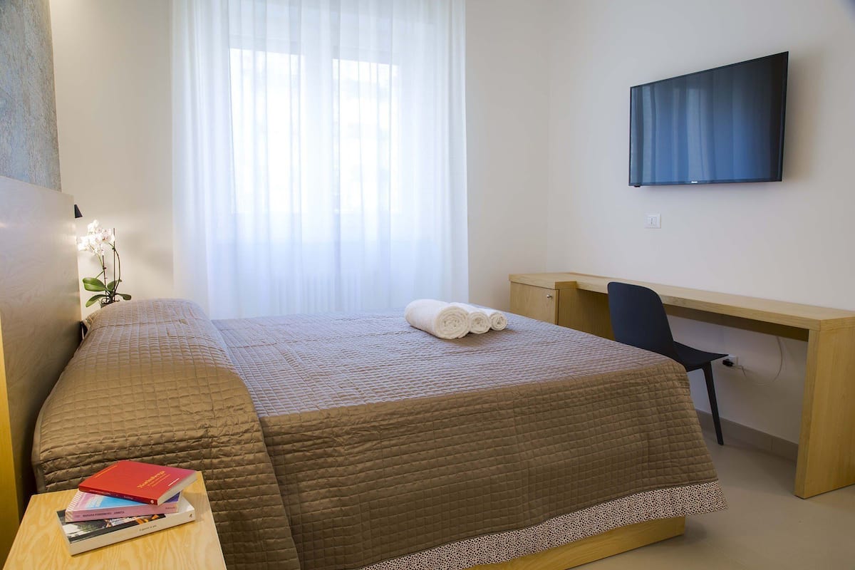 Minibar, desk, laptop workspace, blackout curtains