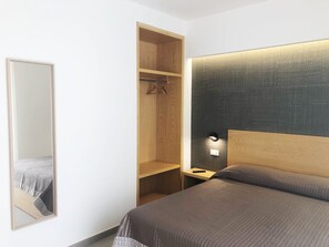 Minibar, desk, laptop workspace, blackout curtains