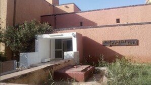 A hotel exterior with a sign reading "HOTEL ANAHUAC." - Hotel Antar Bechar (Bechar)