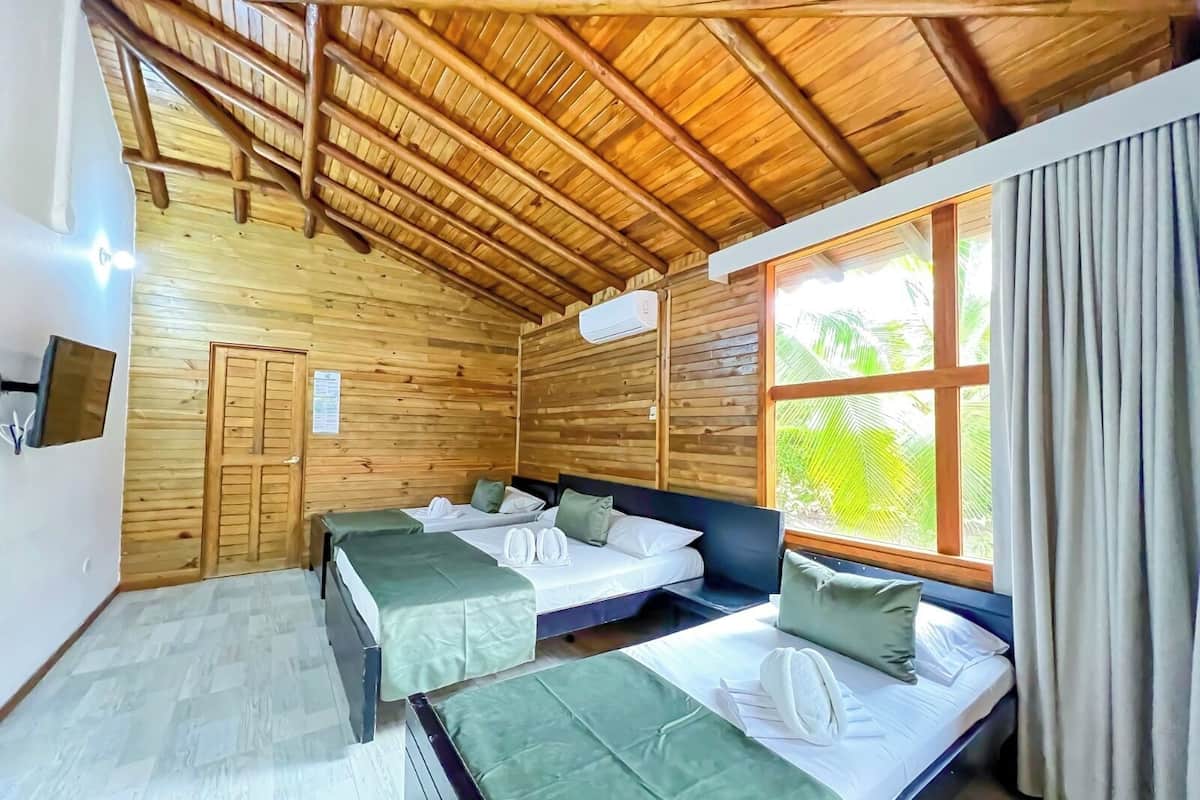 Standard Room, Pool View | Minibar, in-room safe, blackout curtains, iron/ironing board