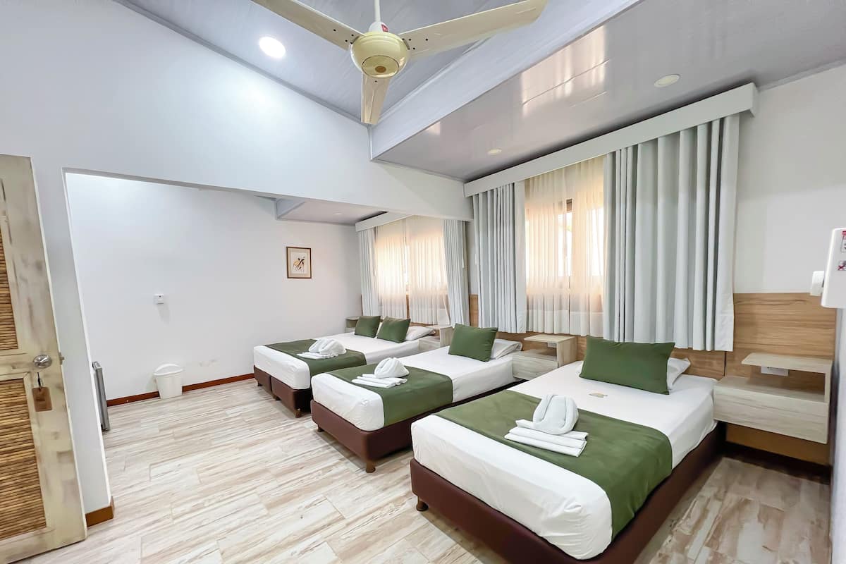 Superior Room, Ocean View | Minibar, in-room safe, blackout curtains, iron/ironing board