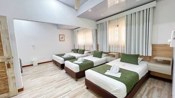 Superior Room, Ocean View | Minibar, in-room safe, blackout drapes, iron/ironing board