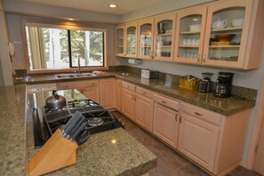 Fridge, microwave, oven, stovetop - Riverfront Escape with A/C, Hot Tub and Scenic Views (Sunriver)