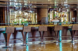 2 bars/lounges, 2 beach bars, poolside bar