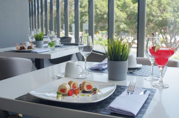 Breakfast, lunch, dinner served; local and international cuisine