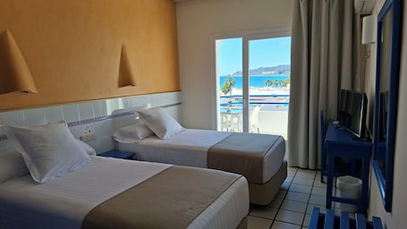 Habitación individual | Cortinas opacas, tabla de planchar con plancha, wifi gratis. Hotel Playa Bocaina