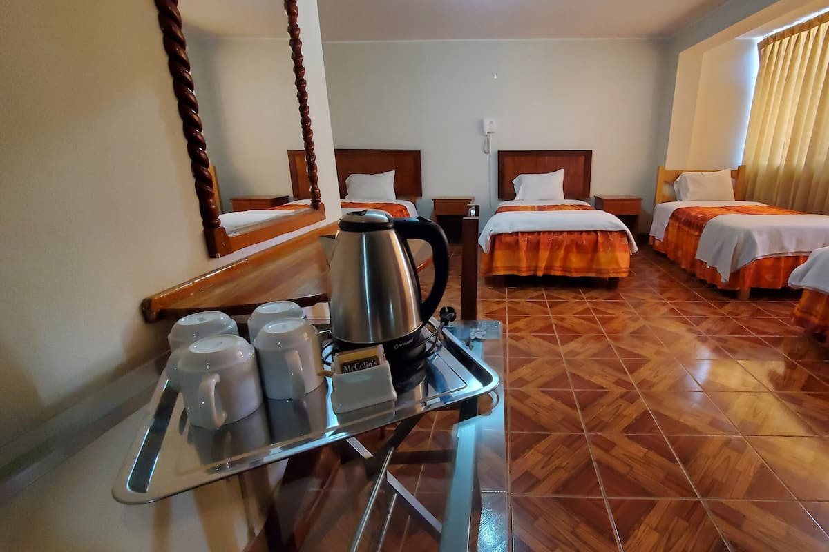 Quadruple Room | In-room safe, desk, laptop workspace, blackout curtains