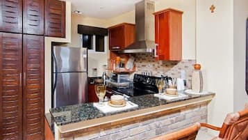 Comfort Apartment, Ocean View | Private kitchen | Fridge, dishwasher, cookware/dishes/utensils