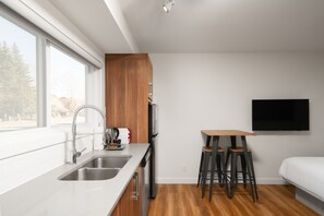 Iron/ironing board, free WiFi, bed sheets - Basecamp Resorts Canmore I Micro-Suite Apartment (Canmore)