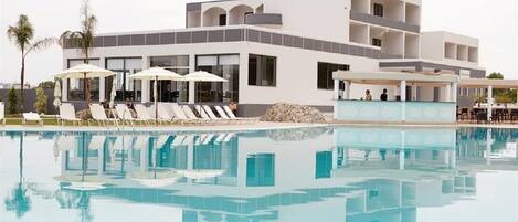 Outdoor pool, pool umbrellas, pool loungers